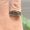 Anillo en oro de 14 quilates con moldavita natural