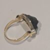 Anillo en oro de 14 quilates con moldavita natural
