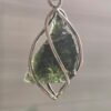 Dije en plata 9.25 con moldavita natural