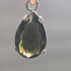 Dije en plata 9.25 con moldavita natural facetada